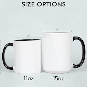 May include: Two white ceramic mugs with black handles and rims are displayed, showcasing size options. The smaller mug is 3.8" high and 3.3" wide, labeled "11oz." The larger mug is 4.7" high and 3.4" wide, labeled "15oz." The text "SIZE OPTIONS" is at the top.