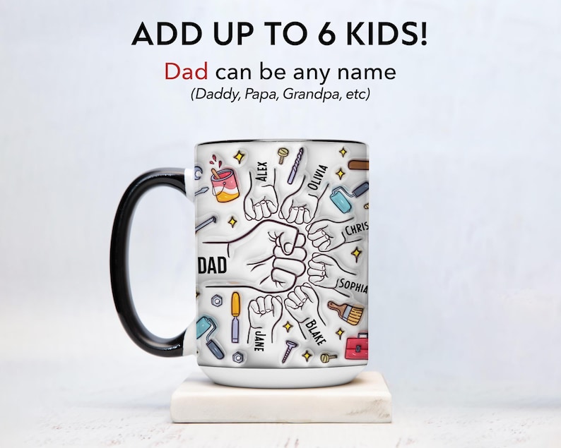 May include: White ceramic mug with a black handle and rim, featuring the word "DAD" and illustrations of tools and fists. The mug includes the text "ADD UP TO 6 KIDS!" and names like "ALEX" and "OLIVIA".