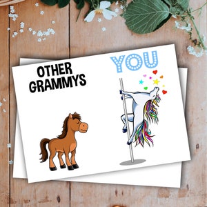 May include: A greeting card with a white background and a humorous illustration. The left side of the card says "Other Grammys" and shows a brown horse. The right side of the card says "You" and shows a unicorn on a pole with a rainbow mane and tail.