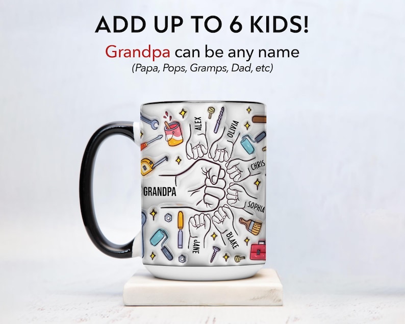 May include: White ceramic mug with a black handle and rim. The mug features the text "Grandpa" with illustrations of tools and fists, surrounded by names. The top text reads "ADD UP TO 6 KIDS!" and "Grandpa can be any name".