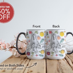 May include: White ceramic mug with a black handle. The mug features a floral design with the word "Mama" and the names "Sophia", "Ava", and "Chris" printed on it. The mug is printed on both sides.
