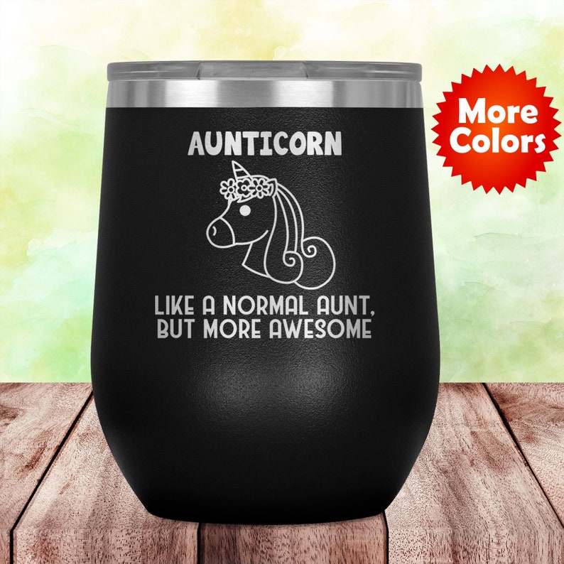 May include: Black stainless steel wine tumbler with a white unicorn graphic and the text "Aunticorn Like a normal aunt, but more awesome".