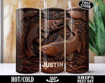 May include: A brown and gold stainless steel tumbler with a design of fish and a leafy pattern. The tumbler has the word "Justin" printed on it.