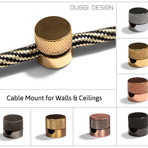 May include: A set of cable mounts for walls and ceilings in various finishes, including gold, silver, copper, and black. The mounts have a textured design and a small opening for the cable to pass through.