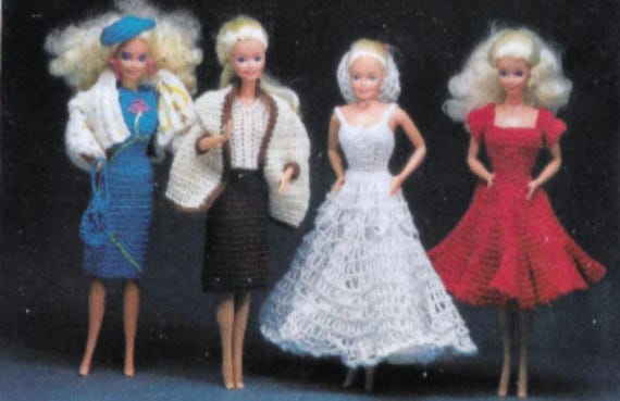 Four barbie doll sale