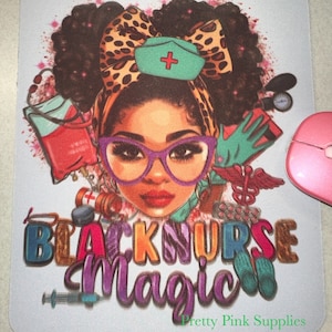 May include: A rectangular mousepad featuring a stylized illustration of a Black nurse with purple glasses, a leopard print bow, and a green nurse's cap. The words "BLACK NURSE MAGIC" are prominently displayed.