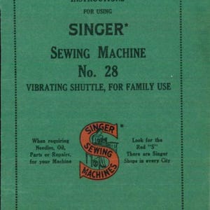 May include: A vintage green instruction booklet for a Singer Sewing Machine No. 28. The cover features the Singer logo in red and orange, with text detailing the machine's model and use. The booklet is marked "Printed in Great Britain."