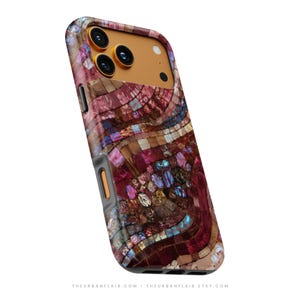 May include: A smartphone case featuring a mosaic pattern of iridescent, multi-colored tiles in shades of deep red, purple, and blue. The camera cutout area is a solid gold color. The text THEURBANFLAIR.COM THEURBANFLAIR.ETSY.COM is at the bottom.