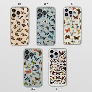 May include: Five clear phone cases with different butterfly designs. The cases are all for the iPhone 13 Pro Max. The butterflies are in various colors, including blue, green, orange, and yellow. The cases are numbered 1 through 5.