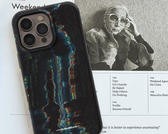 May include: A black smartphone case featuring a distorted, glitch-style pattern with iridescent rainbow light streaks. The case has a cutout for a triple-lens camera system and the text THEURBANFLAIR printed in white near the bottom edge.