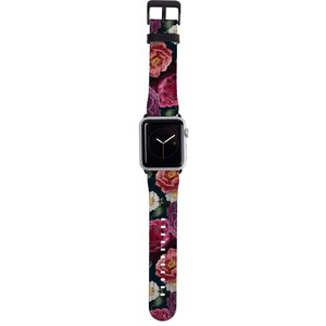 May include: A black watch band with a floral pattern featuring pink, red, and white flowers on a dark background.