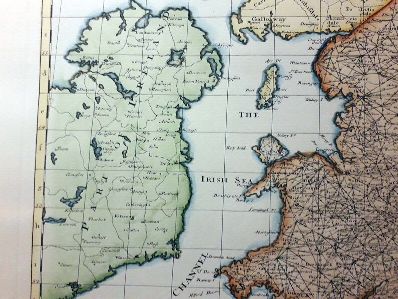 May include: An antique map of Ireland with a green outline of the island and a blue outline of the surrounding sea. The map includes the text "PART of IRELAND" and "THE IRISH SEA".