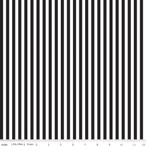 May include: Black and white striped fabric with a ruler showing 12 inches.