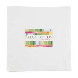 May include: A square white fabric with a colorful rectangular label in the center. The label features the text "BELLA SOLIDS moda" in a mix of green, pink, orange, and blue hues. The fabric appears to be a quilting square.