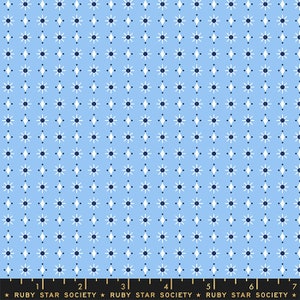 May include: A light blue fabric with a repeating pattern of white stars and dark blue diamonds.