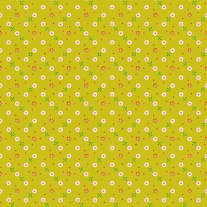 May include: A mustard yellow fabric featuring a repeating pattern of small white flowers with pink centers, arranged in diagonal rows. Interspersed between the flowers are tiny clusters of four green dots and single orange dots.
