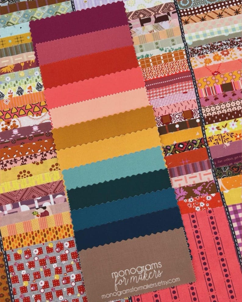 May include: A collection of fabric strips featuring a wide variety of patterns including floral, geometric, and plaid designs in shades of red, orange, yellow, teal, and brown. A central stack of solid-colored fabric strips with pinked edges.