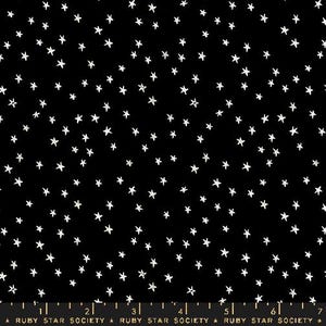 May include: Black fabric with a white star pattern. The stars are of varying sizes and are scattered randomly across the fabric.