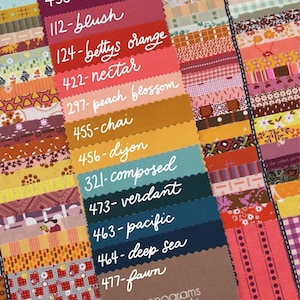 May include: A collection of fabric swatches featuring various patterns and colors, with a central vertical strip displaying solid color samples labeled 453-rose wine, 112-blush, 124-bettys orange, 422-nectar, 297-peach blossom, 455-chai, 456-dijon, 321-composed, 473-verdant, 463-pacific, 464-deep sea, 477-fawn, and the text monograms for makers.