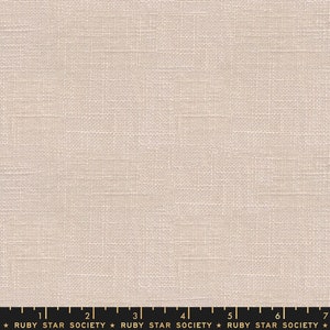 May include: A close-up of a beige linen fabric with a subtle woven texture. The fabric is smooth and has a slightly rough feel.