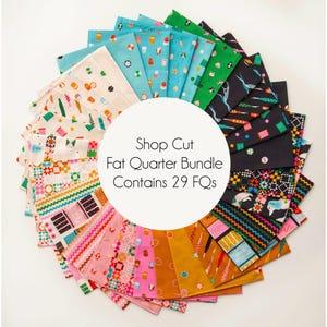 May include: A circular arrangement of 29 fabric fat quarters featuring diverse patterns and colors including cream, teal, green, black, pink, and gold. A central white circle contains the text: Shop Cut Fat Quarter Bundle Contains 29 FQs.