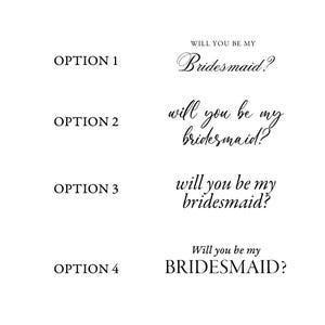 May include: Four options for bridesmaid proposal cards. Each option features the text "Will you be my Bridesmaid?" in different fonts and styles. The options are numbered and presented on a white background.