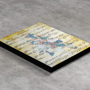 May include: A rectangular canvas print with a musical score background and a colourful illustration of characters. The print has a black border and the text "Passion Kingdom Hearts" is visible.