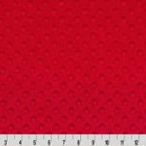May include: Red fabric with a textured, raised pattern of small circles.