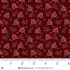 May include: A fabric with a repeating floral pattern. The design features pink flowers, green leaves, and small red berries on a deep red background. Tiny yellow stars are scattered throughout the pattern. The fabric is measured in inches.