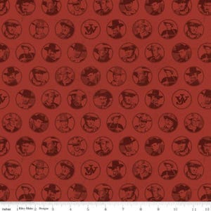 May include: Red fabric with a repeating pattern of cowboy portraits in circular frames. The design includes the letter "W" in some circles. The fabric has a vintage, distressed look, with the text "Riley Blake Designs" at the bottom.