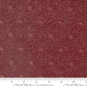 May include: Red fabric with a white floral pattern. The pattern features small white flowers with a dotted outline and a repeating vine design.