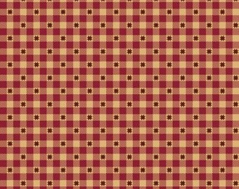 May include: A red and beige checkered pattern with small brown stars in each square.