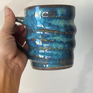two turquoise ceramic handmade  mug