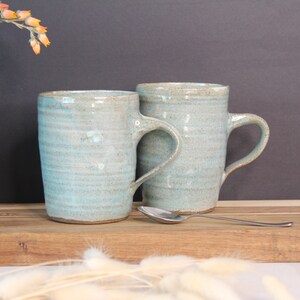 two turquoise ceramic handmade  mug