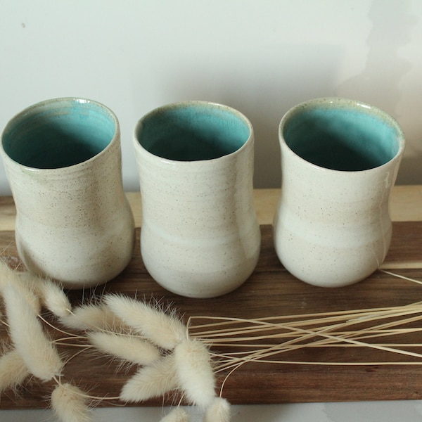 set of three white and blue ceramic cup without hundle