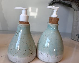 Handmade ceramic soap dispenser set for kitchen or bathroom, designed for everyday use and durability.