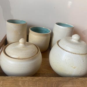 White  Jar with Lid - An Elegant Addition to Your Kitchen Décor.