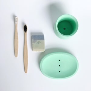 Plat de savon en béton vert et support de brosse à dents ensemble