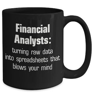 May include: Black coffee mug with white text that reads "Financial Analysts: turning raw data into spreadsheets that blows your mind".