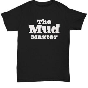 May include: Black t-shirt with white text that reads "The Mud Master".