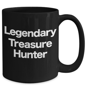 Schatz-Jäger-Becher schwarz Kaffeetasse lustiges Geschenk für Flipper ReSeller Antiquitäten Urban Keys Spiel