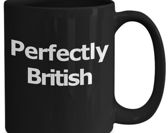 May include: Black ceramic coffee mug with white text that reads "Perfectly British".