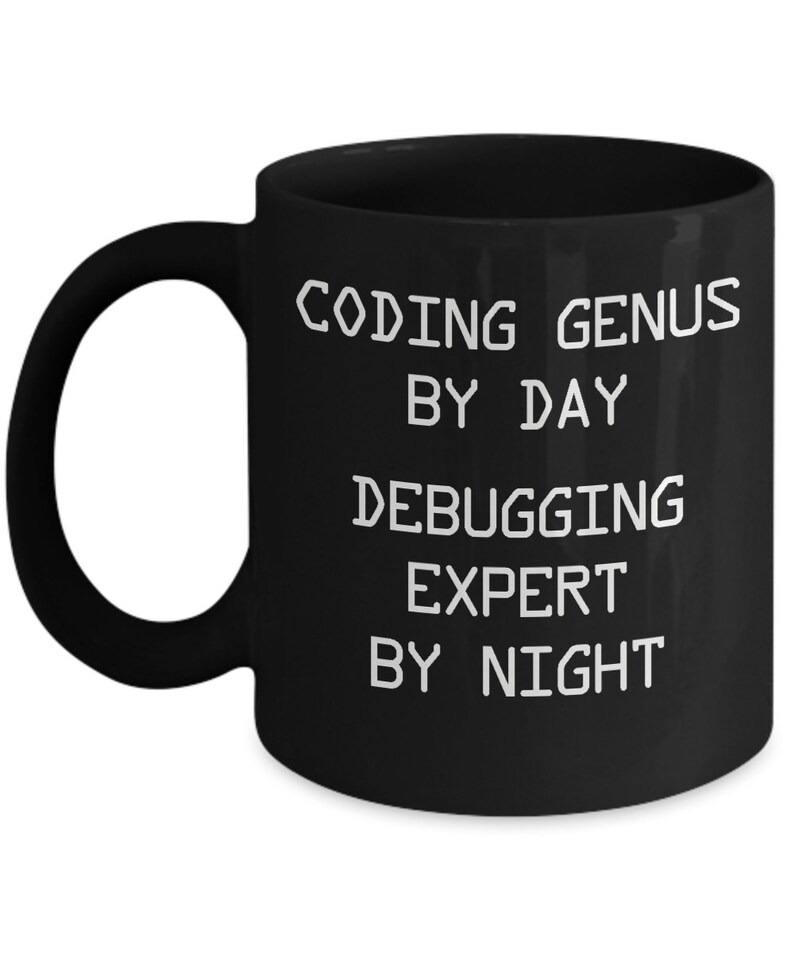 May include: Black coffee mug with white text that reads "Coding Genius by Day Debugging Expert by Night".