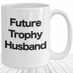 Future Trophy Husband Mug – Funny Boyfriend Gift – White Ceramic Coffee Cup – Wedding Engagement Gift for Him – Future Husband Gag Gift