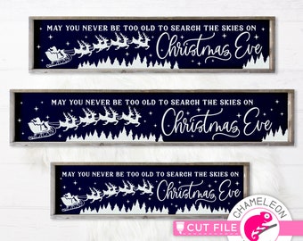 May include: Three navy blue wood signs with white text and images. The signs read "May you never be too old to search the skies on Christmas Eve". Each sign features a white silhouette of Santa's sleigh pulled by reindeer flying through a starry night sky.