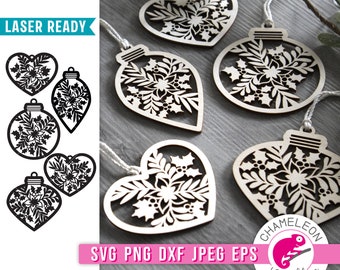 May include: Set of six laser-cut wooden Christmas ornaments in the shape of hearts and ornaments. The ornaments feature a delicate floral design with holly leaves and berries. The ornaments are ready to be painted or left natural.