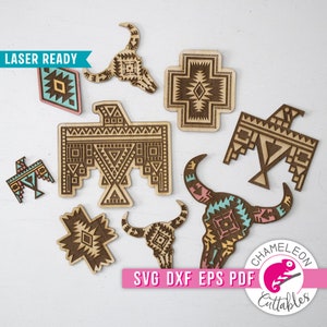 May include: A set of laser-cut wood designs featuring geometric patterns in shades of brown, pink, blue, and yellow. The designs include a cross, a bird, a bull's head, and a traditional Native American symbol. The text "LASER READY" and "SVG DXF EPS PDF" are also included in the image.