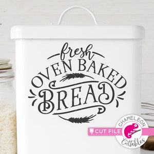 May include: White bread bin with a black and white graphic that says "Fresh Oven Baked Bread" with wheat stalks. The graphic is in a circle with a black border.