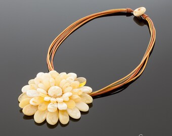 Amber brooch-pendant "Chamomile"