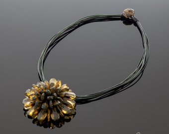 Amber brooch-pendant "Black flower"